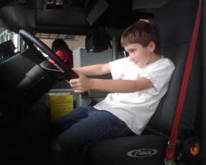James behind the wheel