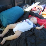 Jacob napping in the trunk bed