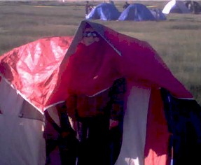 James "in" the tent.