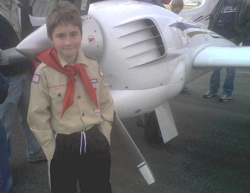 James in front of the plane.