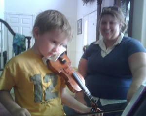 Benjamin at his violin lesson with Meika